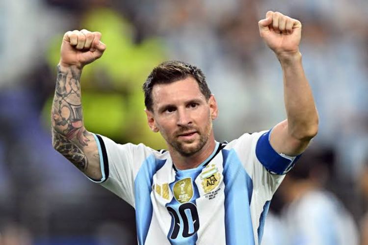Messi sets record as Argentina beat Austria to reach knockout stage