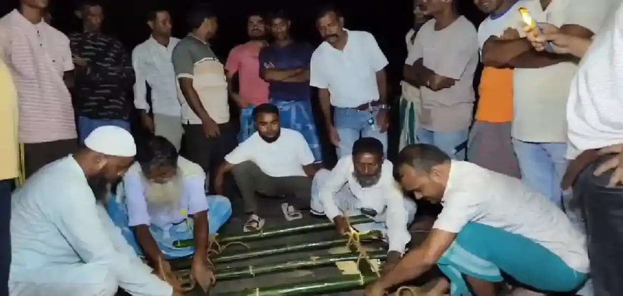 An example of Hindu-Muslim unity in Assam's Ambari-Parerchar village: Muslim community performs last rites of a Hindu youth according to Hindu rituals.