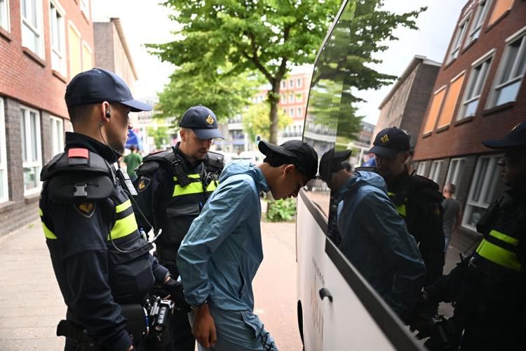 Fans clashed with police after the Netherlands' defeat against Morocco.