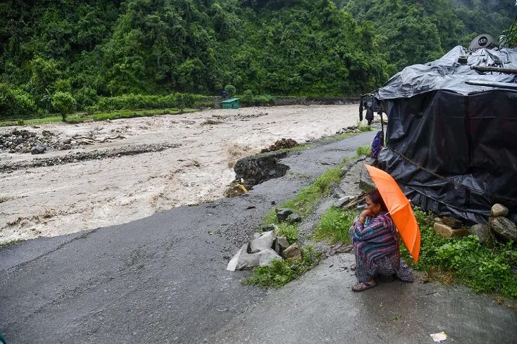 Torrential rains disrupt normal life in Uttarakhand; roads in Khatima inundated; IMD issues alert.