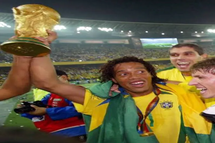 Ronaldinho spotted with the World Cup trophy; adds to the excitement of the final.