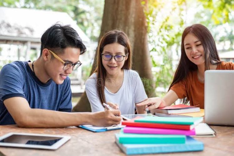 Three people, including two school students
