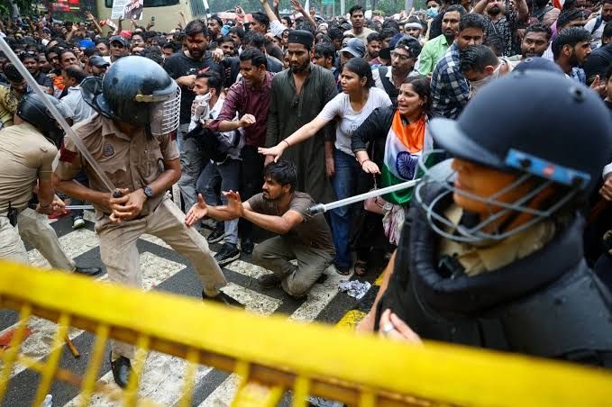 police action against protesting students; meeting adjourned till 2 pm