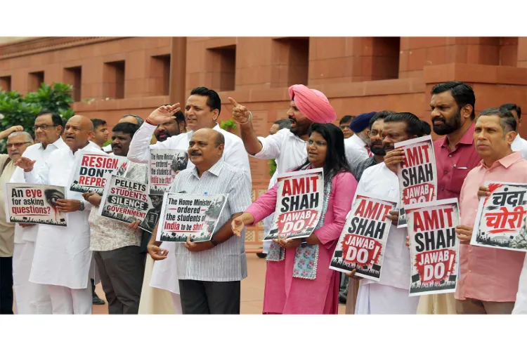 Opposition protests in Parliament today over the student movement.