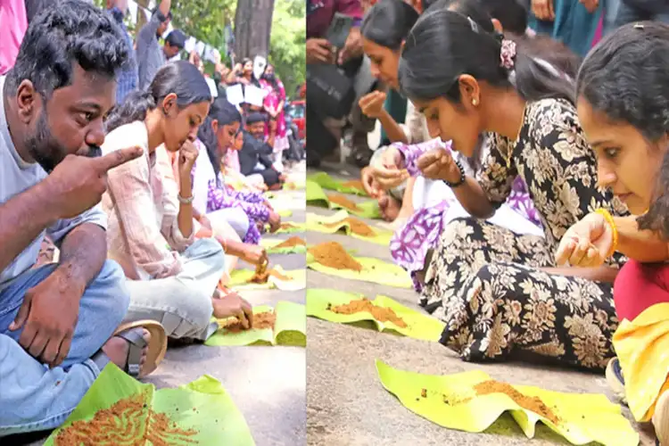 Lower Primary School Teacher rank holders stage symbolic grass-eating protest outside Keralam Secretariat