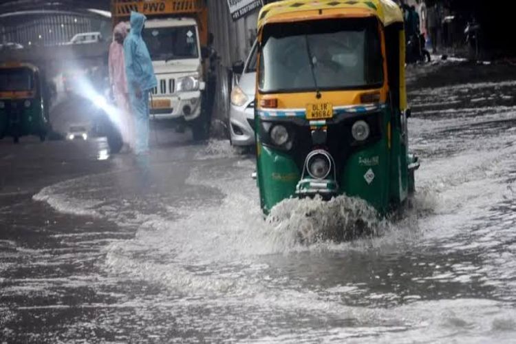  the surrounding areas, with waterlogging and traffic jams affecting normal life.