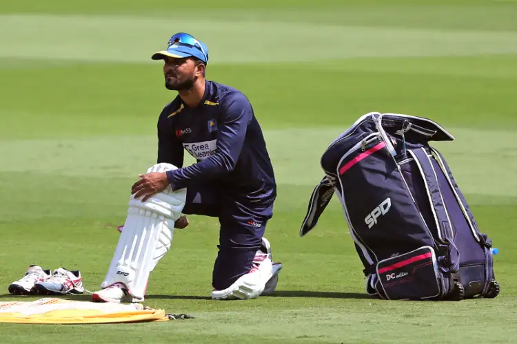 Sri Lankan veteran Chandimal taken for scans after injuring neck, shoulder during Galle Test