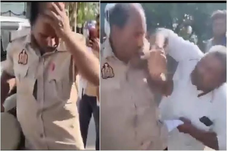 The traffic policeman pulled the driver out from under the truck and took him to the hospital.