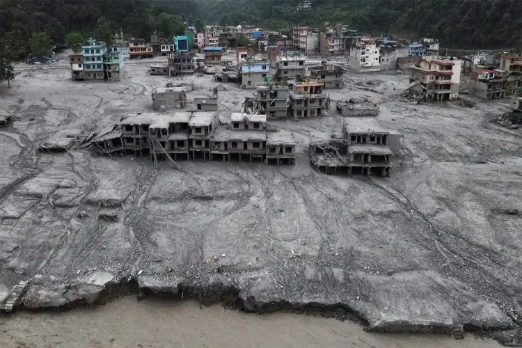 Death toll from floods in Nepal reaches 1,287; 5,083 people missing.