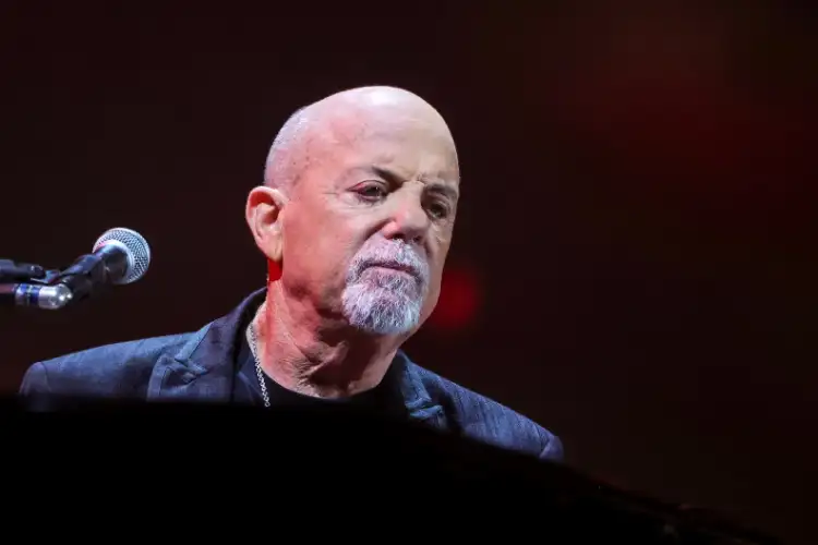 Billy Joel reveals having brain disorder surgery, says “Don’t worry about me”