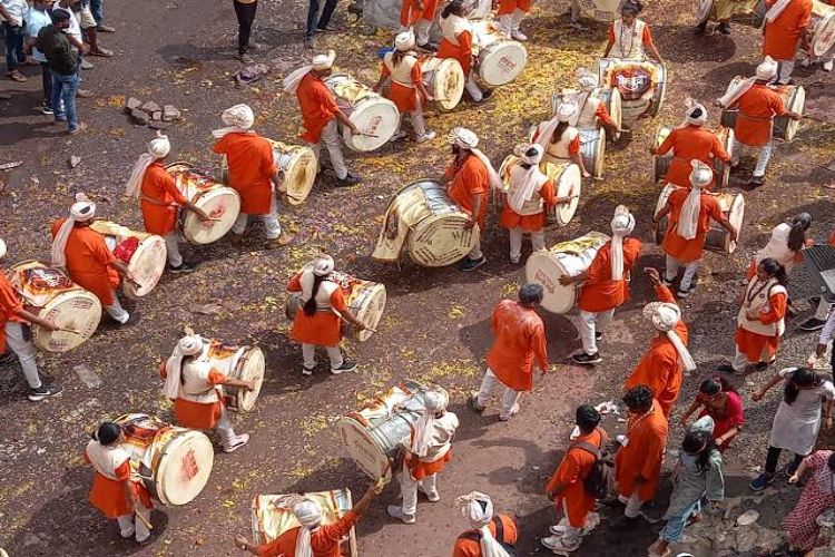 Pune: The immersion journey of Mancha Ganapati started with the sound of drums and cards.