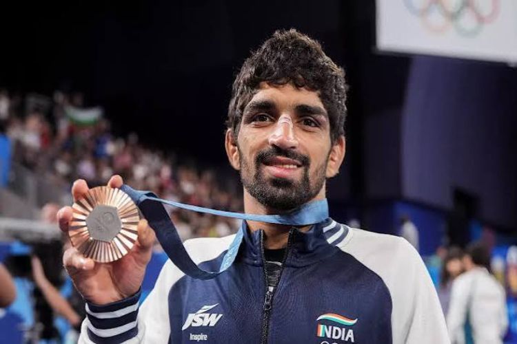Aman and the final gold medal are now just one win away