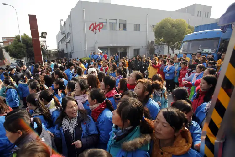 Hundreds of workers demand compensation after China chemical plant shutdown