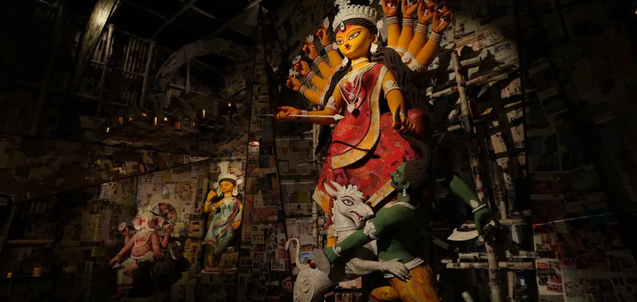A unique Durga Puja pandal in Kolkata adorned with pages from newspapers.
