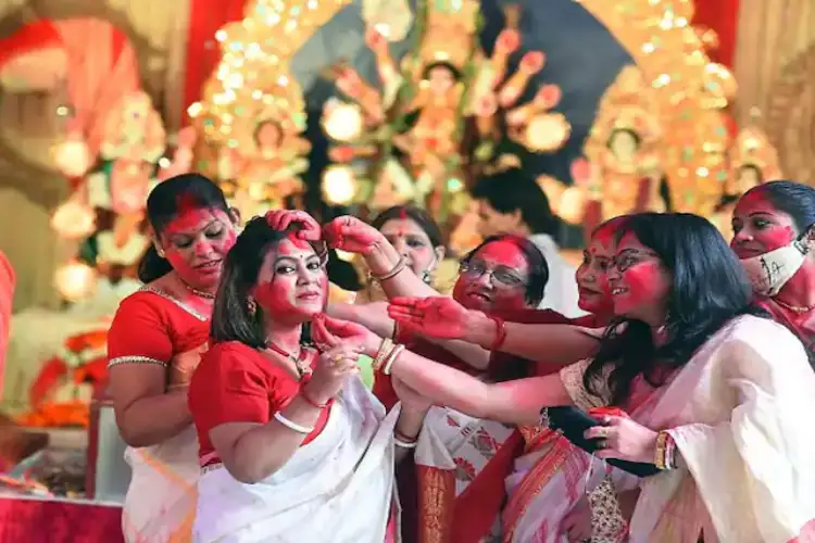Sindoor Khela: Bengali women play with vermilion in Kolkata; see pics 